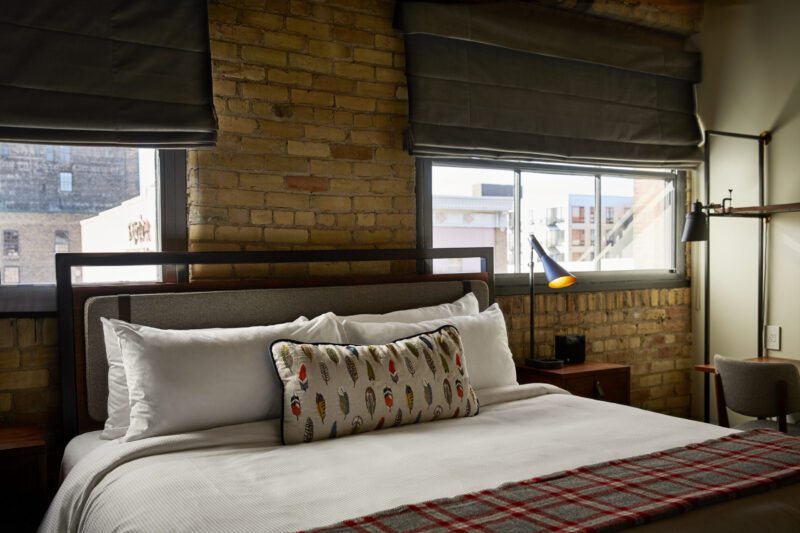 Two windows over a bed at our North Loop hotel in Minneapolis