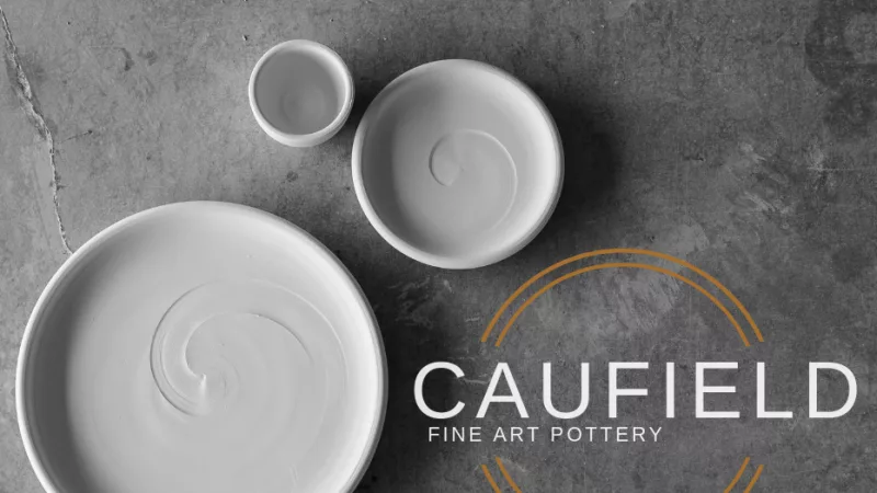 Three pottery bowls from Caufield Fine Art Pottery a collaborator of our Minneapolis hotel