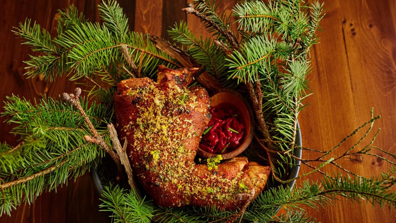 Heavily-seasoned turkey quarter on a bed of pine at our North Loop hotel
